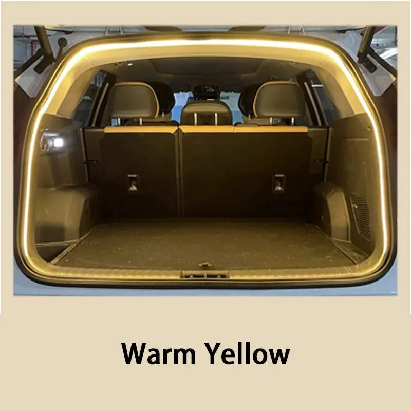Car trunk LED ambient light strip by Simples Market, warm yellow glow around rear opening
