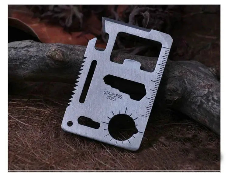 Wallet card knife EDC stainless steel multi-tool with ruler and cutouts for camping.