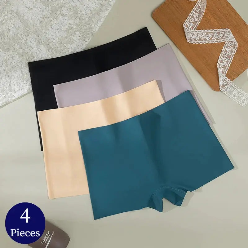 4-piece seamless satin women's boyshort underwear in black, lavender, peach, and teal.