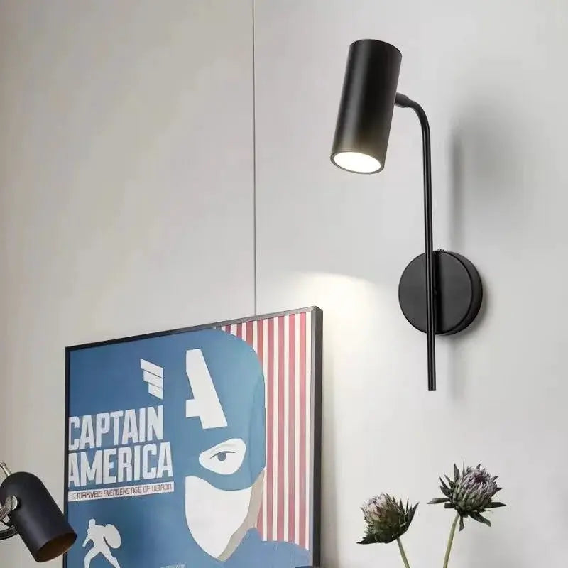 Rotatable wall lamp with black iron frame and cylindrical plastic shade; E27 LED reading light.