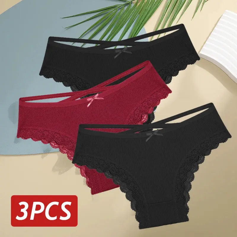 3-piece women's cotton lace-trim bikini panties set in black and red with bow accents, low-rise