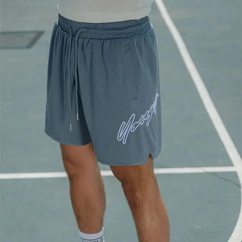 Men's mesh quick-dry shorts by Simples Market in blue-gray with drawstring waist and white script logo.