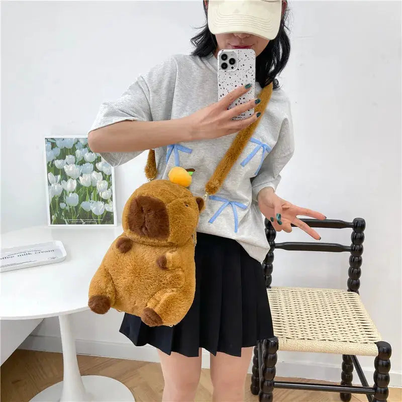 Capybara plush backpack by Simples Market; brown furry crossbody bag for women or kids
