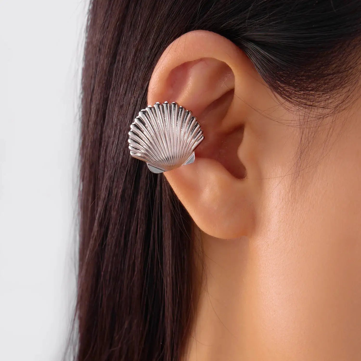 Silver shell-shaped ear clip earring with scallop fan design for women, boho beach jewelry