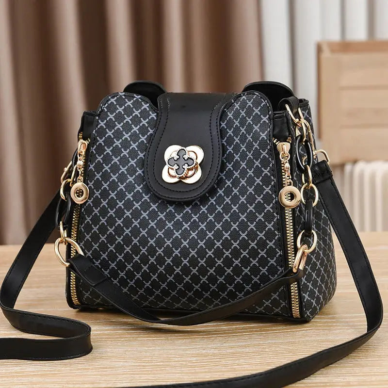 Women bucket crossbody handbag with black faux leather, gray check print, gold hardware