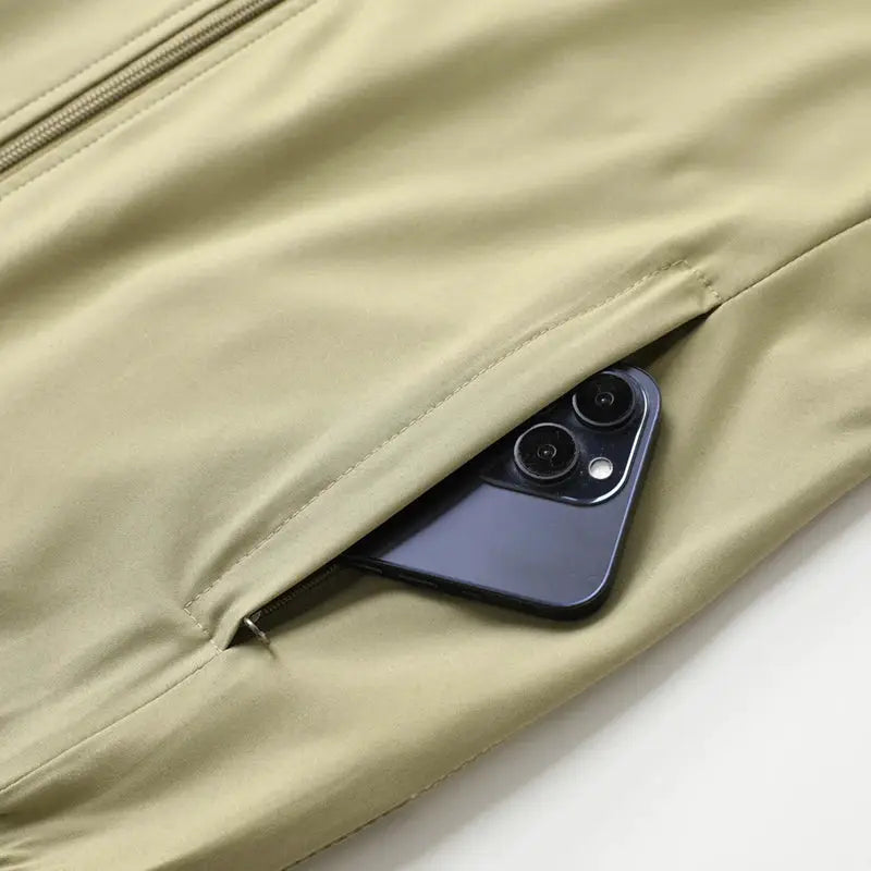 Summer Ultra-Thin Men's Vest in khaki with zippered side pocket holding a smartphone
