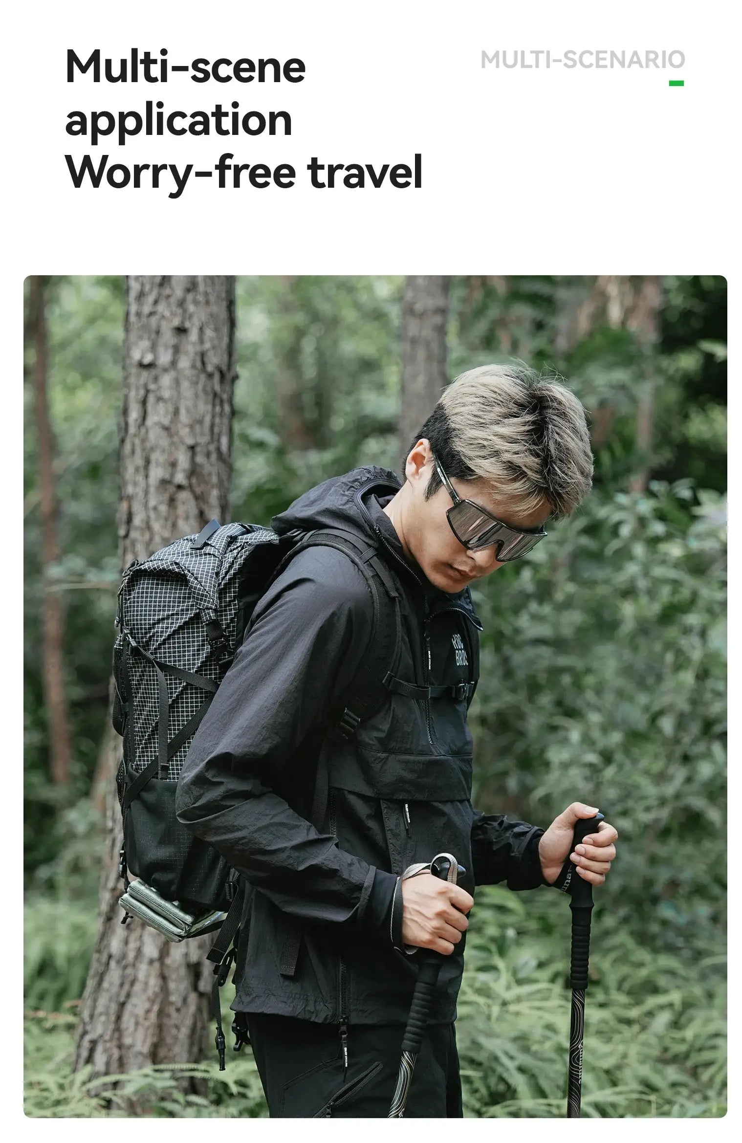 ROCKBROS black waterproof cycling jacket worn by a hiker in a forest with a backpack and trekking poles
