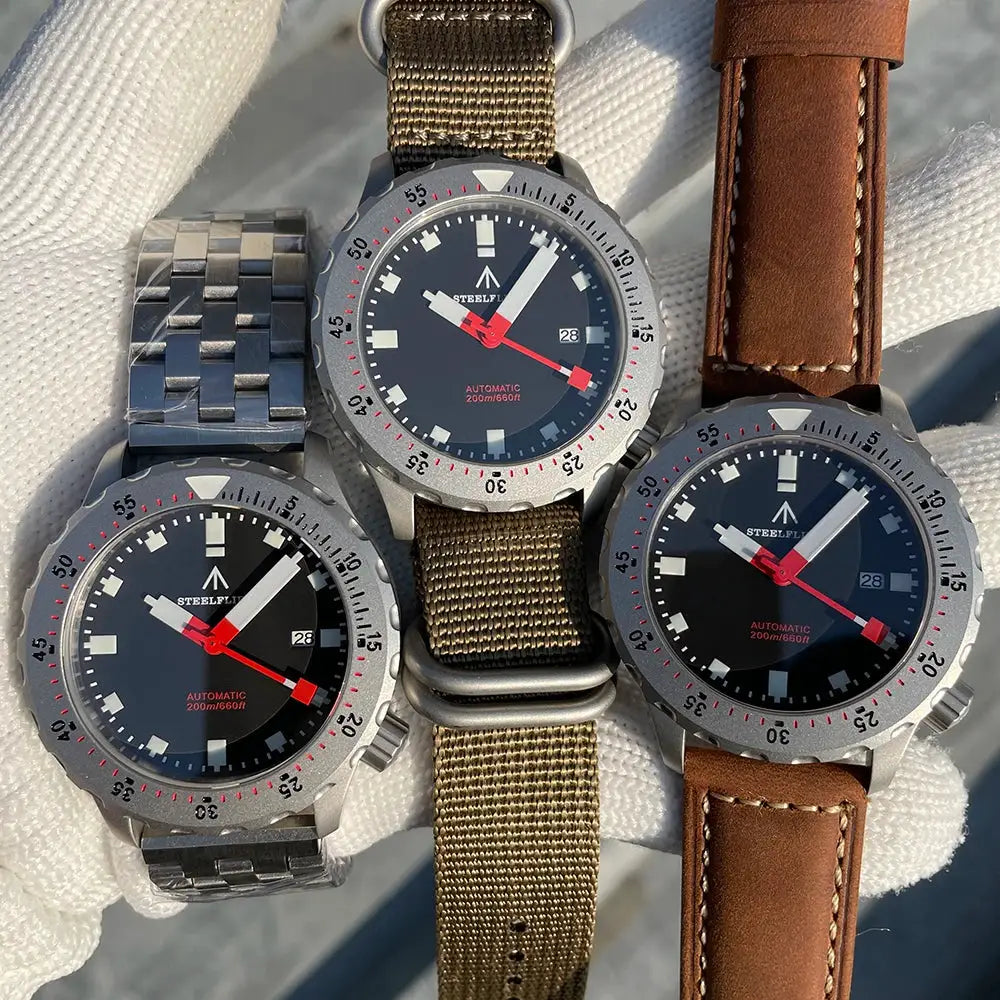 STEELFLIER SF752 dive wristwatch trio with stainless steel case, black dials, red hands, leather and fabric straps