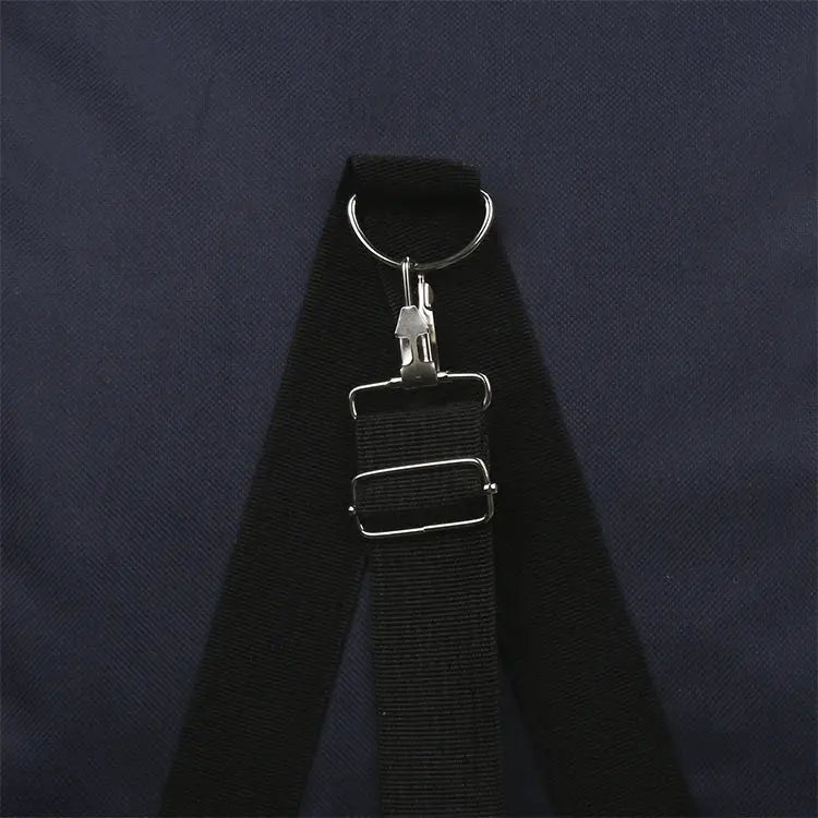 Luggage strap with metal buckle and ring on black nylon fabric