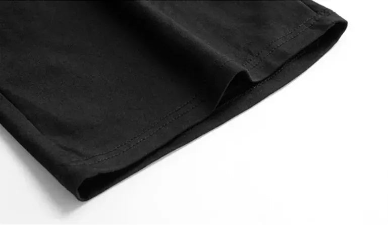 Simples Market men's black knee-length sport shorts for boxing training, fabric hem close-up
