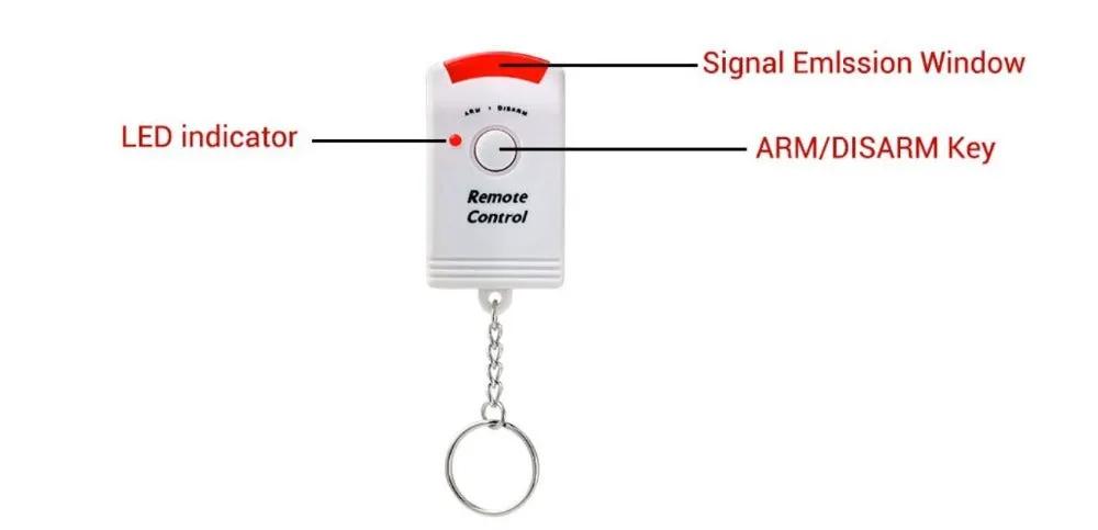 Wireless motion sensor alarm remote control, white body with red top and key ring