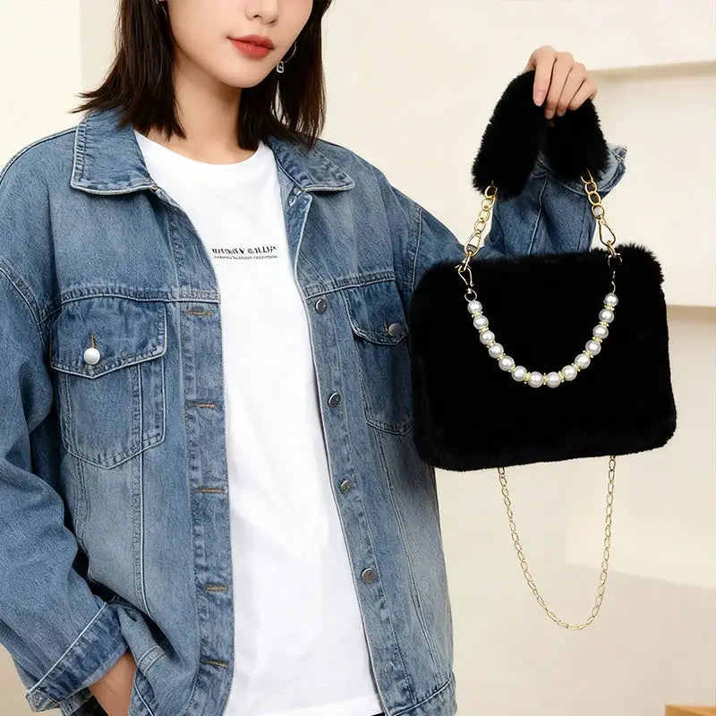 Fashionable Pearl Rabbit Fur Handbag with black fur, pearl handle, and gold chain crossbody strap