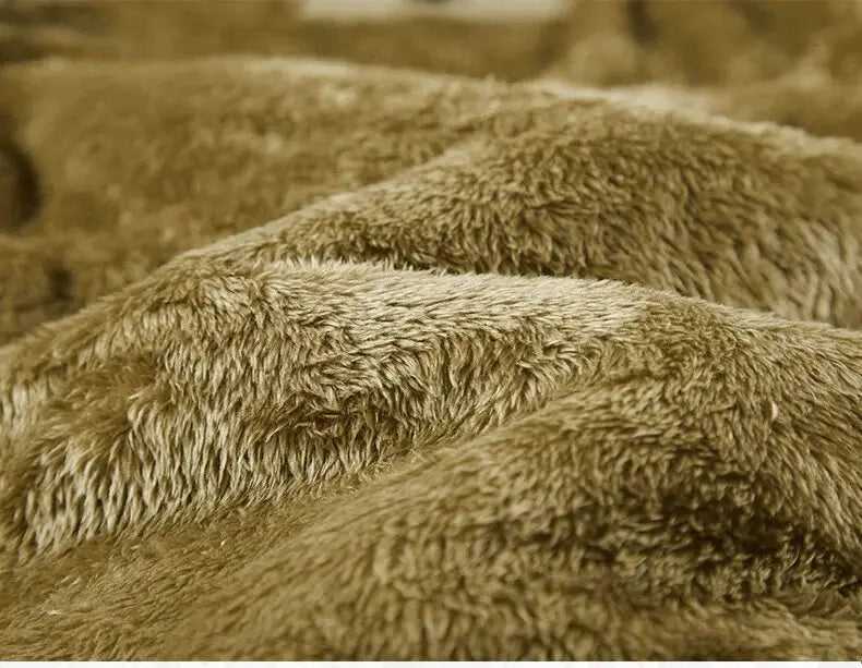 Men's fleece vest brown faux fur fabric close-up with a soft plush texture