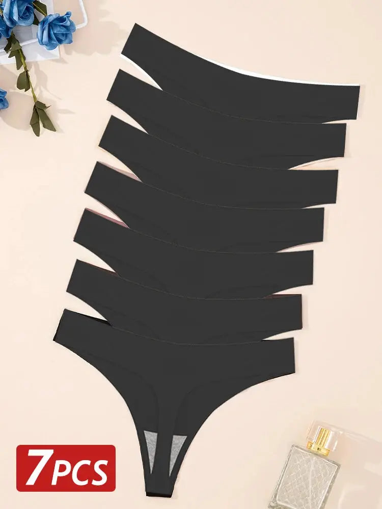 7-piece set of black ice-silk seamless G-string panties by Simples Market; ultra-thin, low-rise T-back.