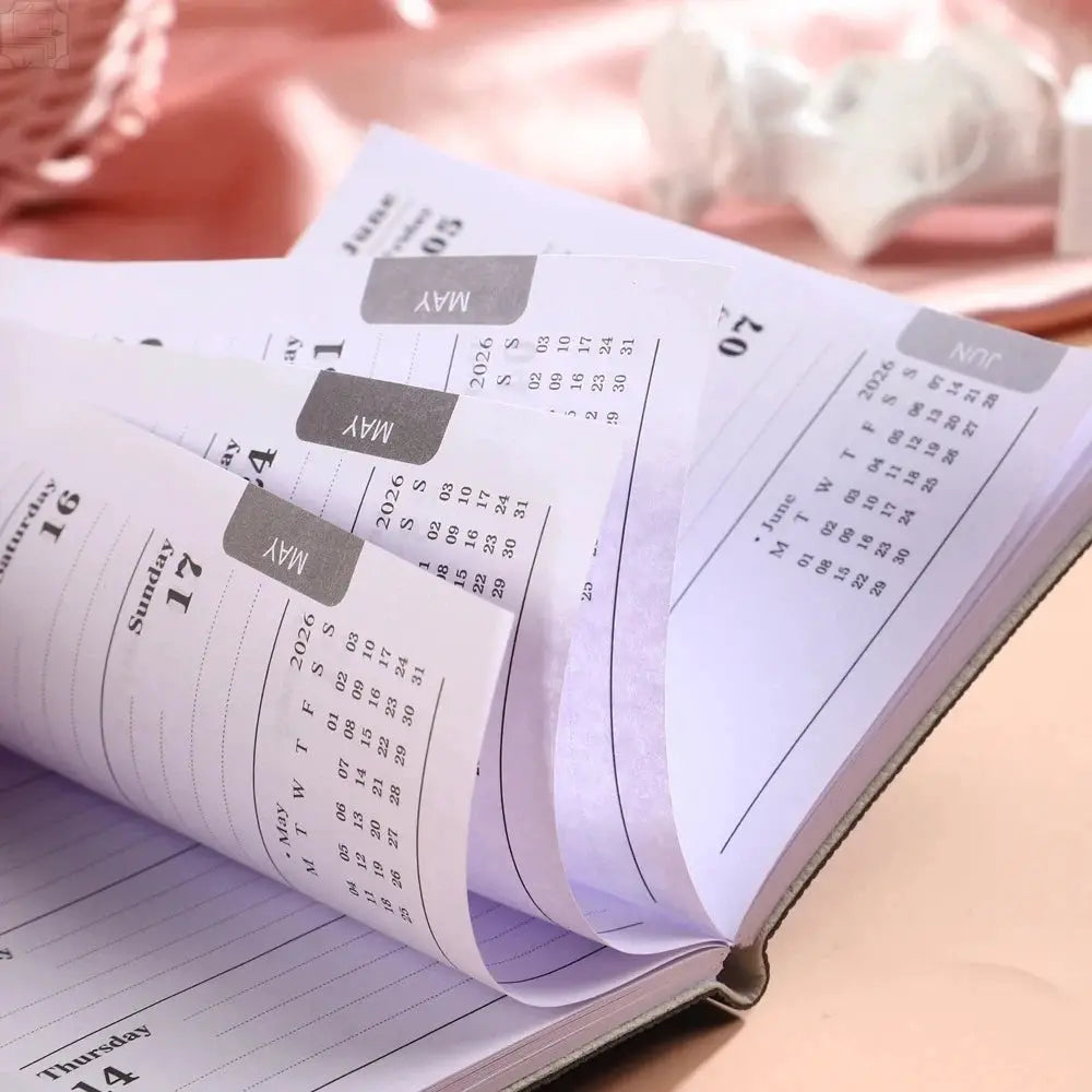A7 daily planner notebook with Morandi PU cover; 64 sheets, 128 pages, weekly calendar.