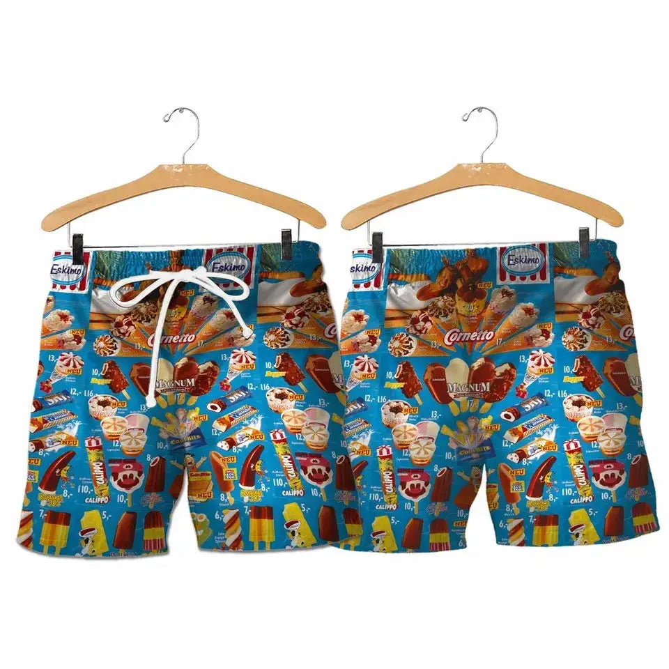 2 blue ice-cream print swim shorts with white drawstrings on wooden hangers; Eskimo pattern.