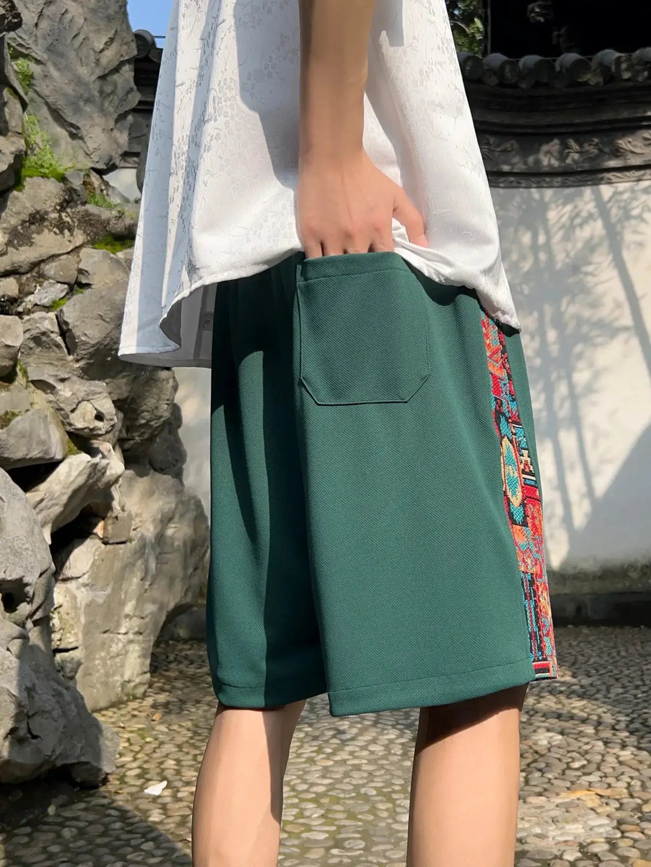 Men's green shorts with ethnic embroidery side stripe and pocket