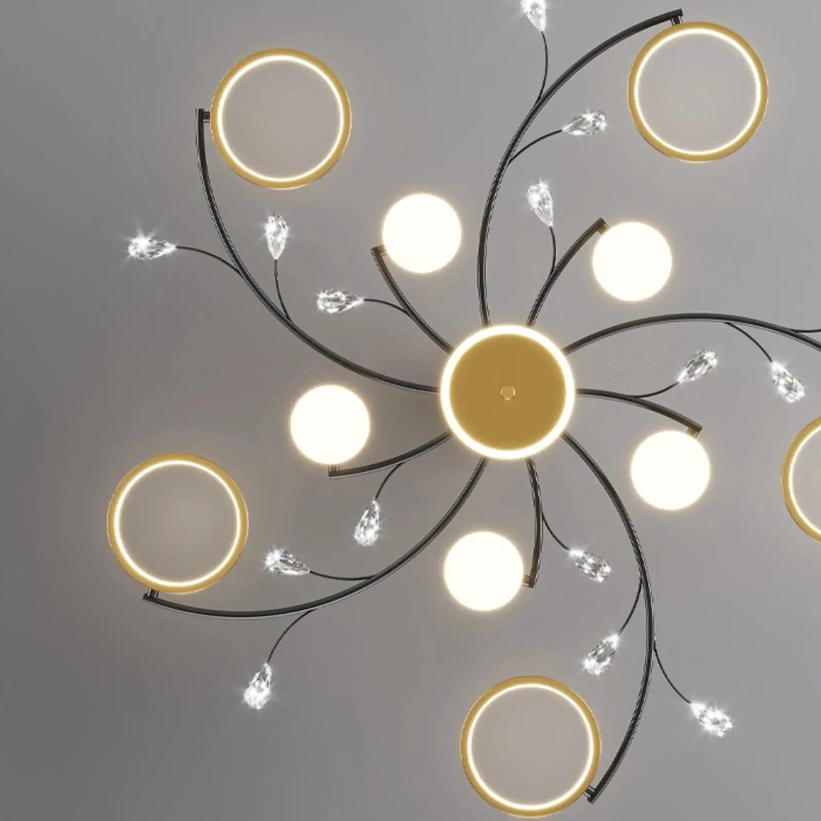 IRALAN modern multi-ring ceiling chandelier with black metal arms, gold LED rings and crystal accents
