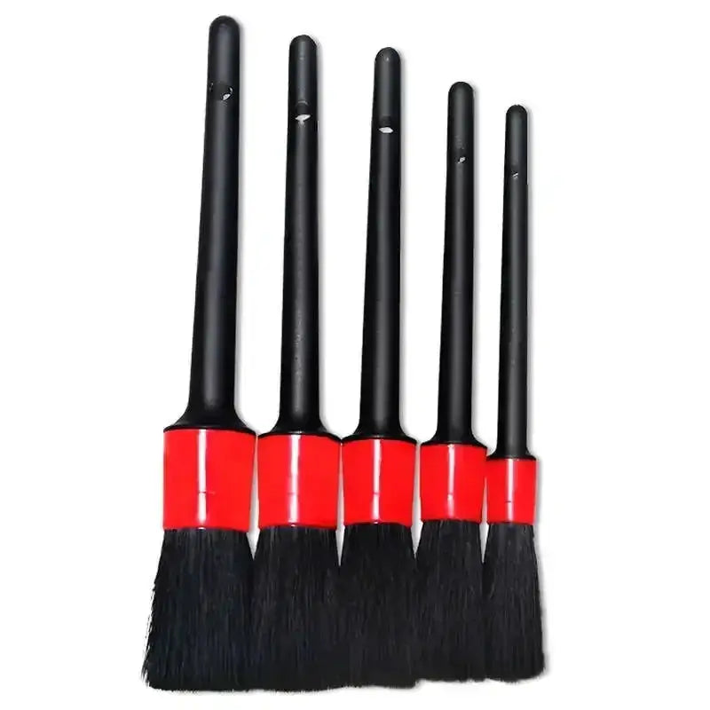 Car detailing brush set by Simples Market, five black-handled brushes with red ferrules for car cleaning.