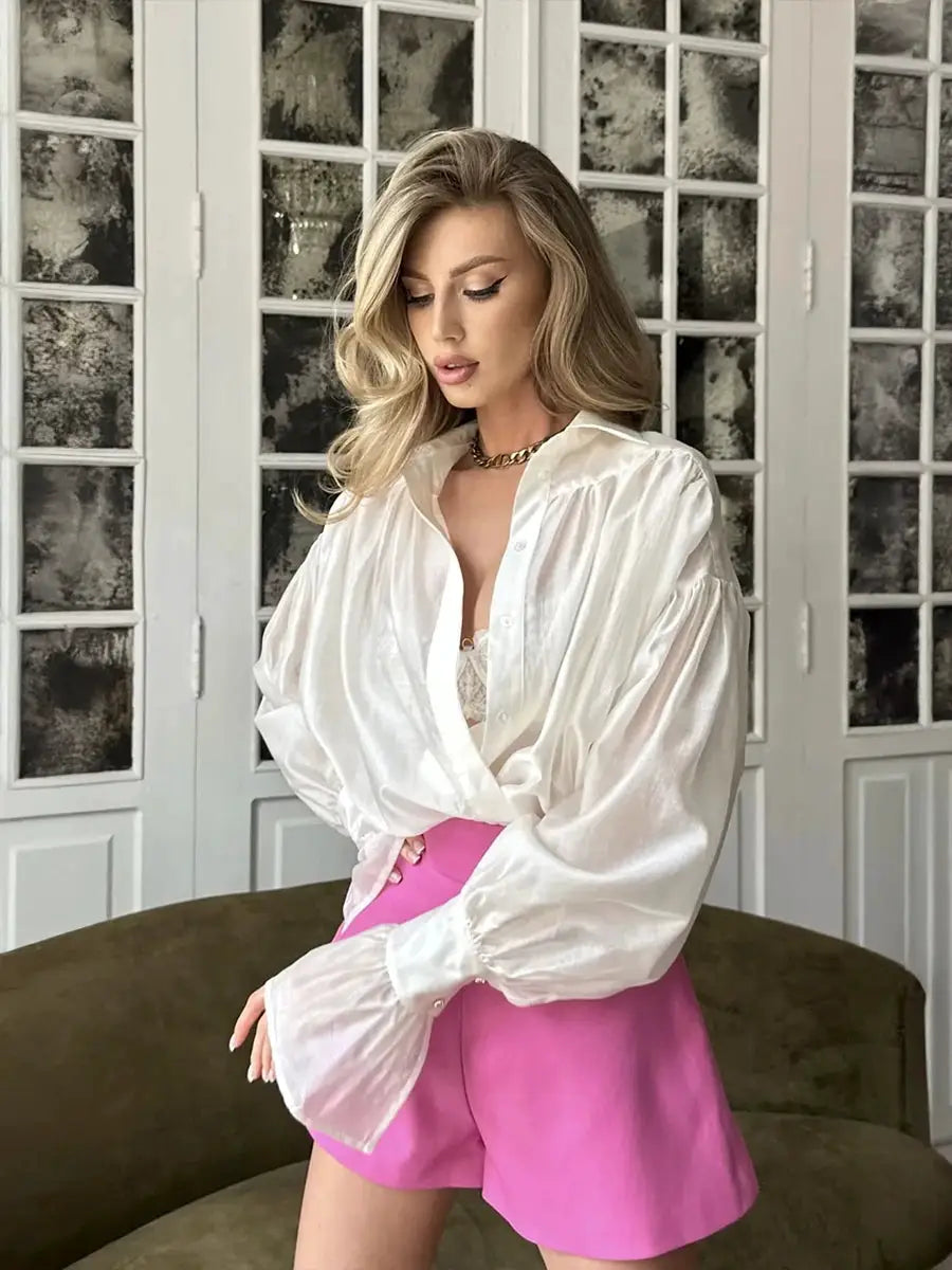 Bornladies white collared shirt with flare sleeves by Simples Market, paired with pink shorts;2pc