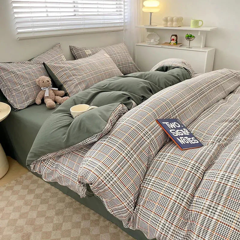 Nordic plaid cotton bedding set by Simples Market including duvet cover, pillowcases and sheets in sage green and plaid