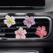 Simples Market 4-pack flower car perfume clips for air vents in white, lavender, pink, and red