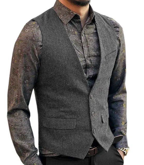 Deep V-Neck suit vest in gray herringbone, slim-fit men's waistcoat worn over a patterned shirt