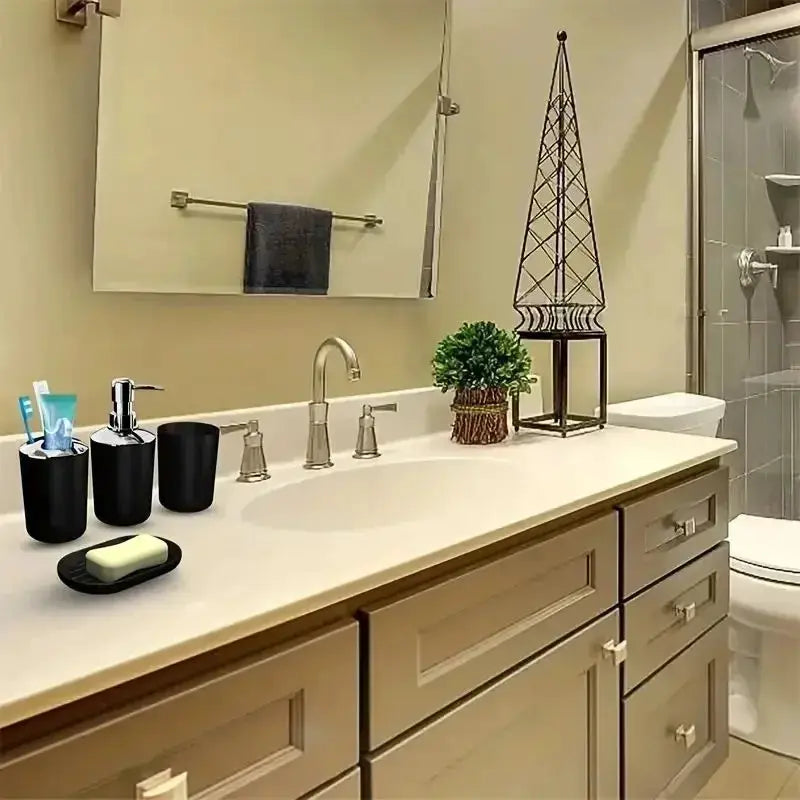 Simples Market 4-piece bathroom set: plastic toothbrush holder, toothbrush cup, soap dispenser, and soap dish in gray/black.