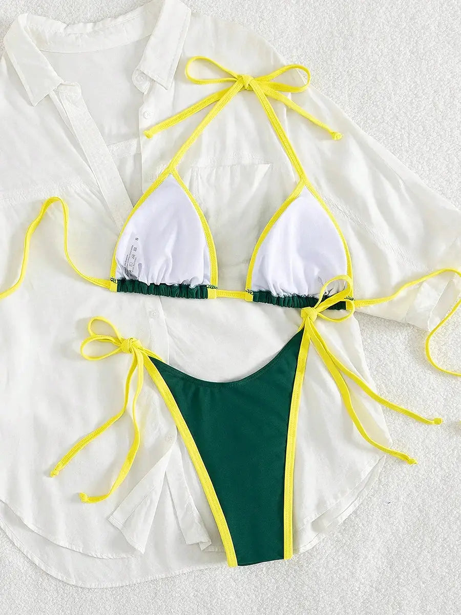 Two-piece bikini set with white triangle top, green bottoms, and yellow trim and ties on a white shirt background.