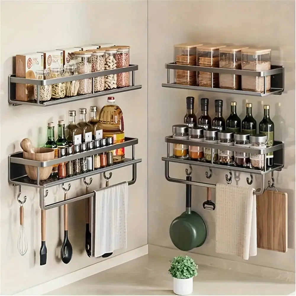 Multi-functional wall-mounted spice and storage rack featuring two silver metal units with glass jars, bottles and utensil hooks.