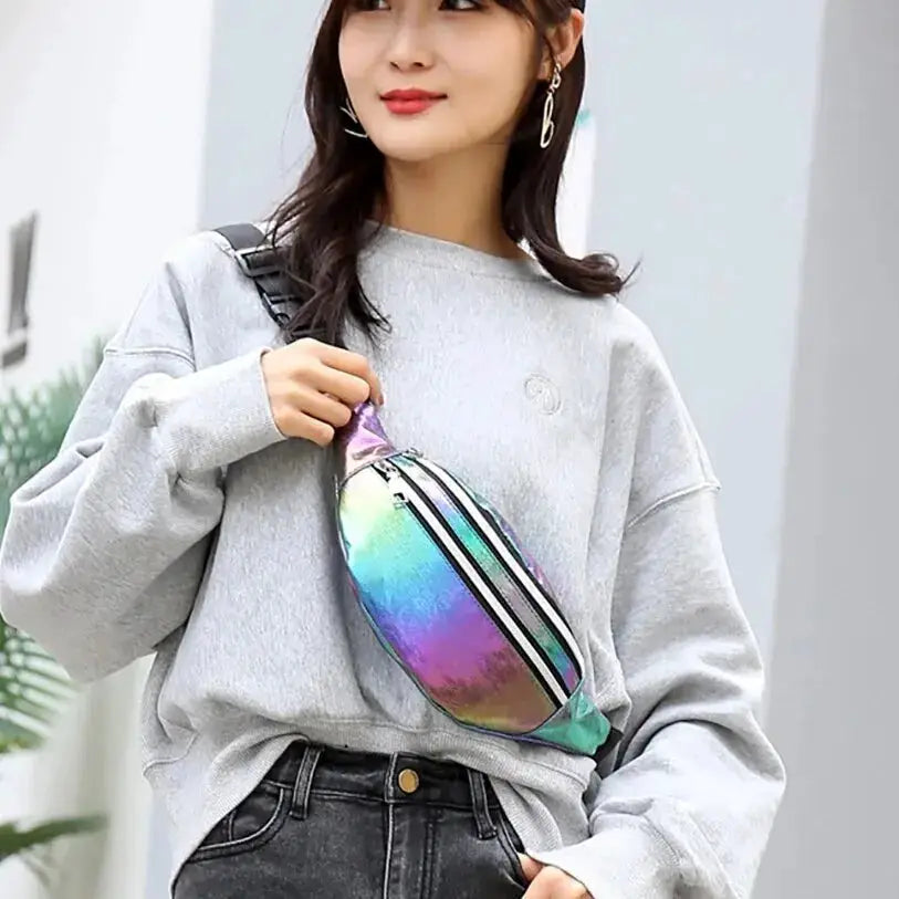 Holographic fanny pack waist bag with zip; iridescent rainbow finish and black strap.