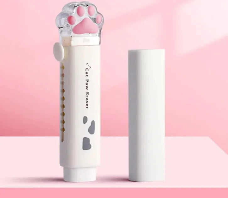 Cat paw eraser by Simples Market with retractable paw-shaped cap, white plastic body