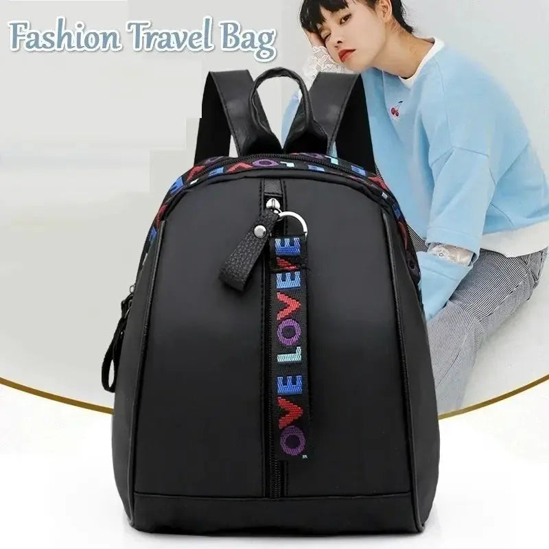 Mini men's black backpack with rainbow LOVE strap, front zipper pocket, Simples Market