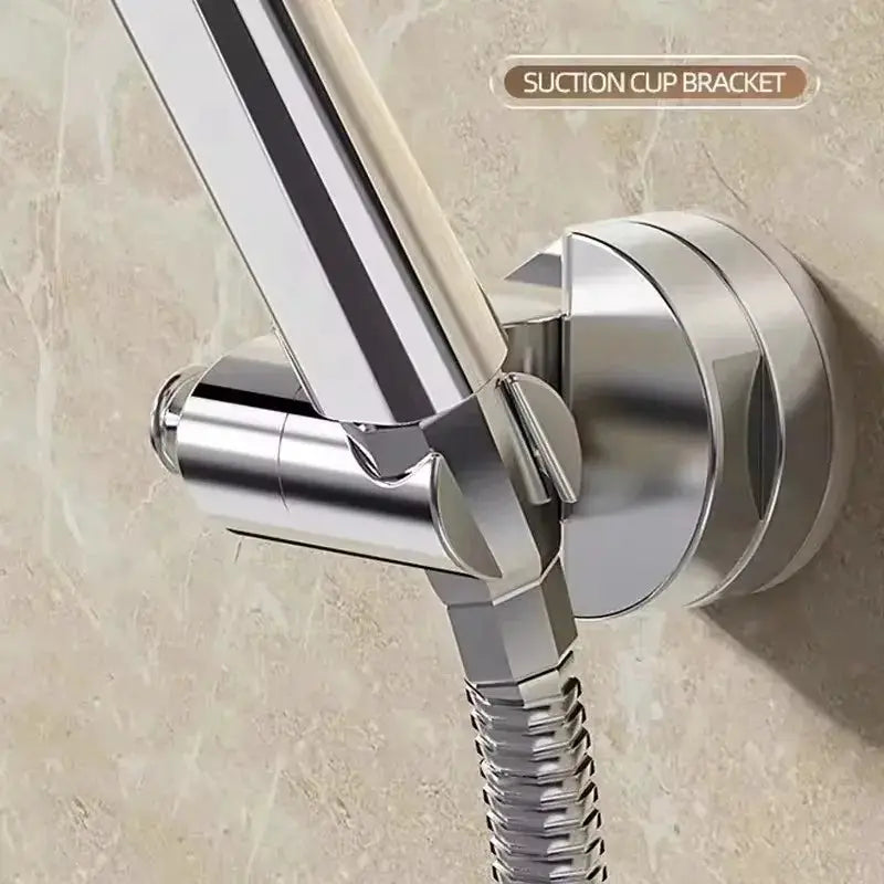 Chrome shower head holder with suction cup mount; 360° adjustable for bathroom.