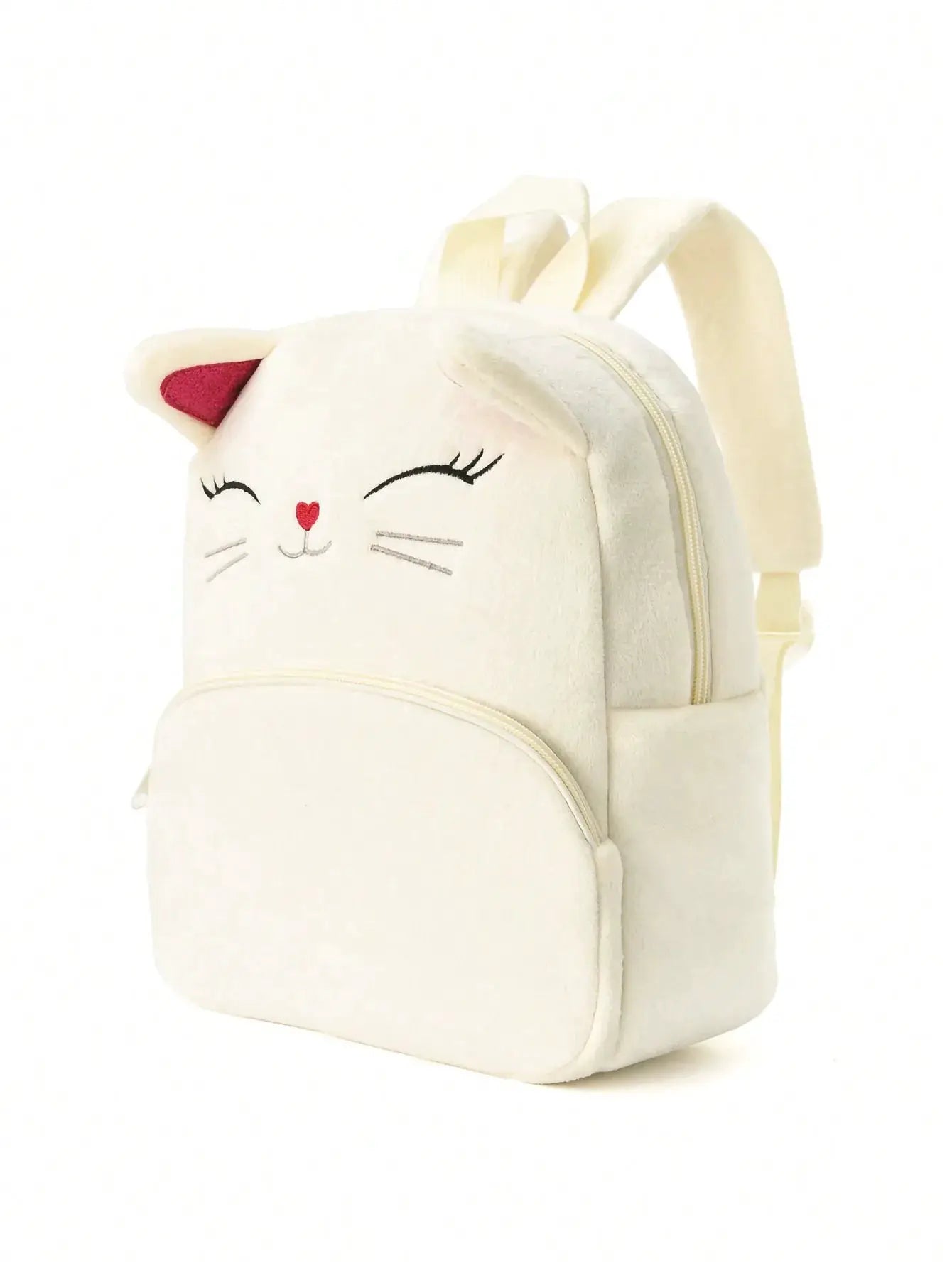 Cream cat-shaped plush backpack for kids by Simples Market, with embroidered face and ears.