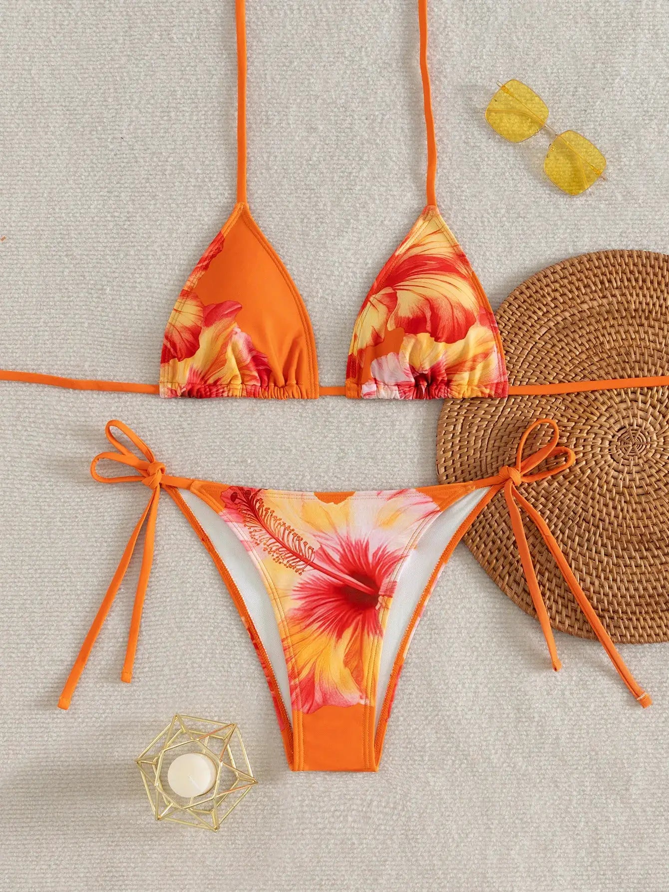 Simples Market 2026 women's bikini set; orange floral two-piece with triangle top and tie-side bottoms