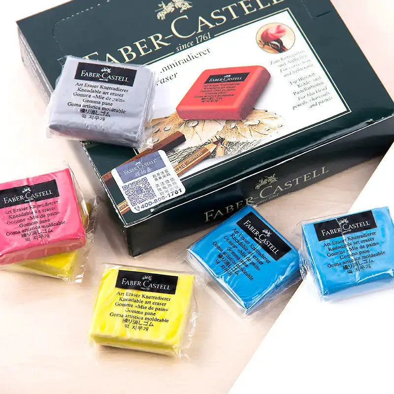 Faber-Castell eraser set with kneaded and plastic erasers in assorted colors on a black box