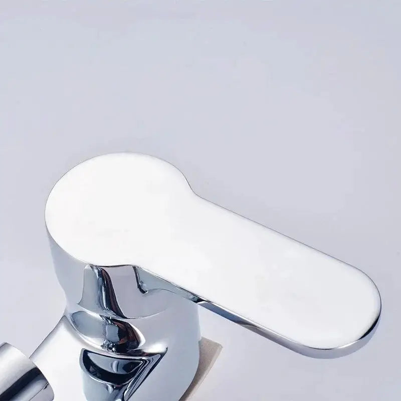 Chrome bathroom basin faucet with a single-lever handle, deck-mounted