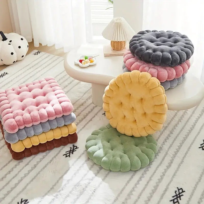 Simples Market large biscuit plush cushions; pastel cookie-shaped seat pads in pink, gray, yellow, brown, and green