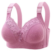 Pink lace bra by Simples Market with floral embroidery and adjustable straps.