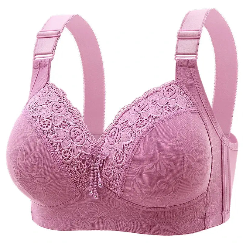 Pink lace bra by Simples Market with floral embroidery and adjustable straps.