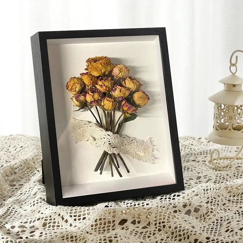 Shadow box depth 3cm wooden photo frame, black finish, displaying a dried yellow rose bouquet tied with lace