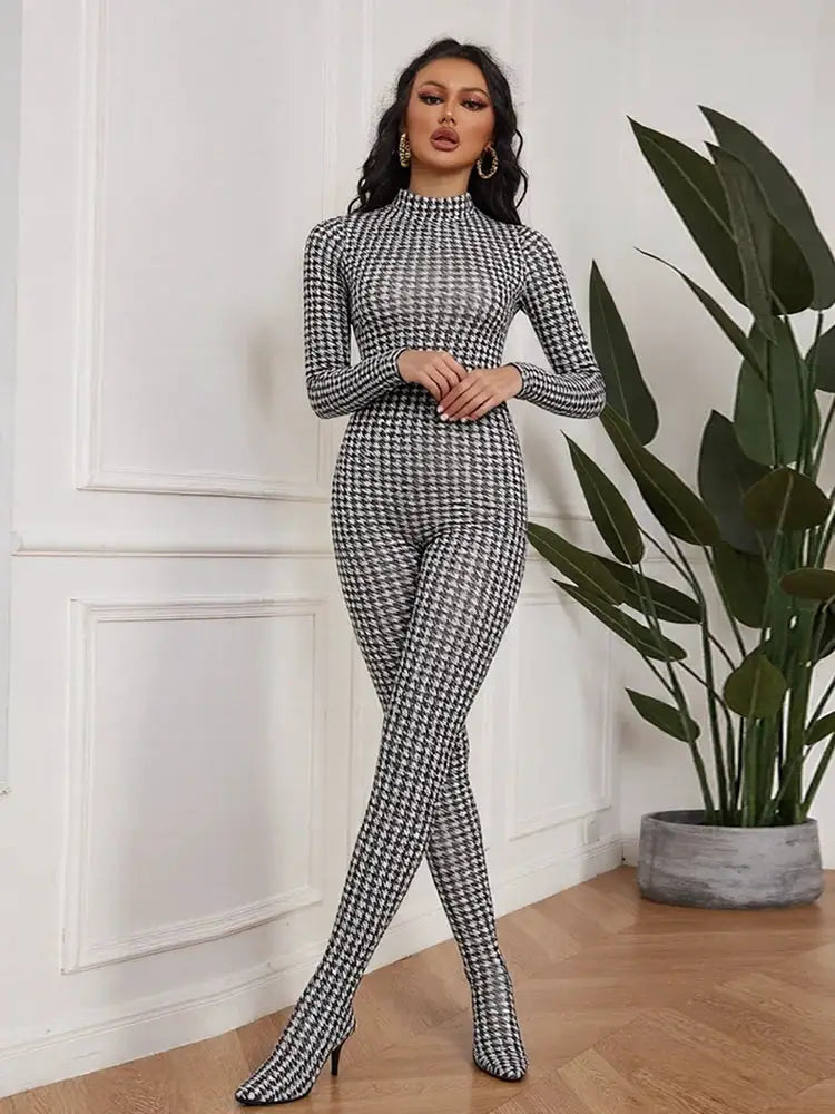 Sisterlinda jumpsuit in black-and-white houndstooth, turtleneck, long sleeves, skinny fit