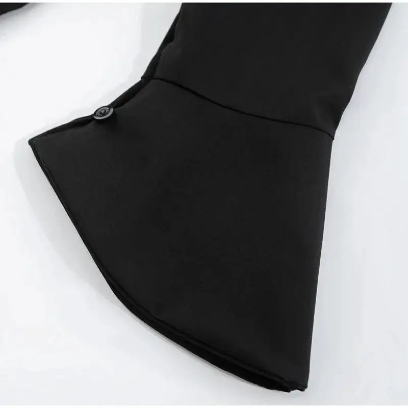 Simples Market black women's blouse with curved hem, long sleeves, and button accents