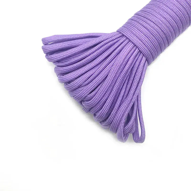 Purple 4mm 550 paracord bundle with 7-strand core for survival, camping and climbing