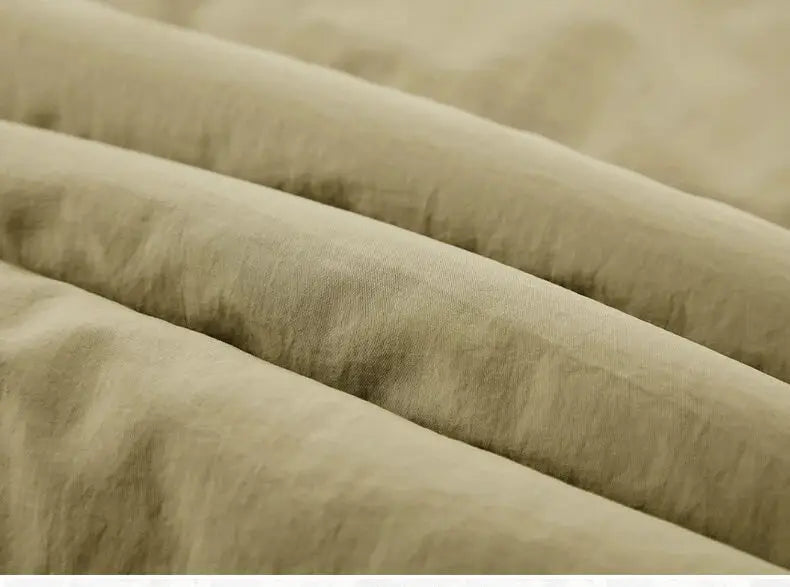 Men's fleece vest fabric close-up in beige with soft folds