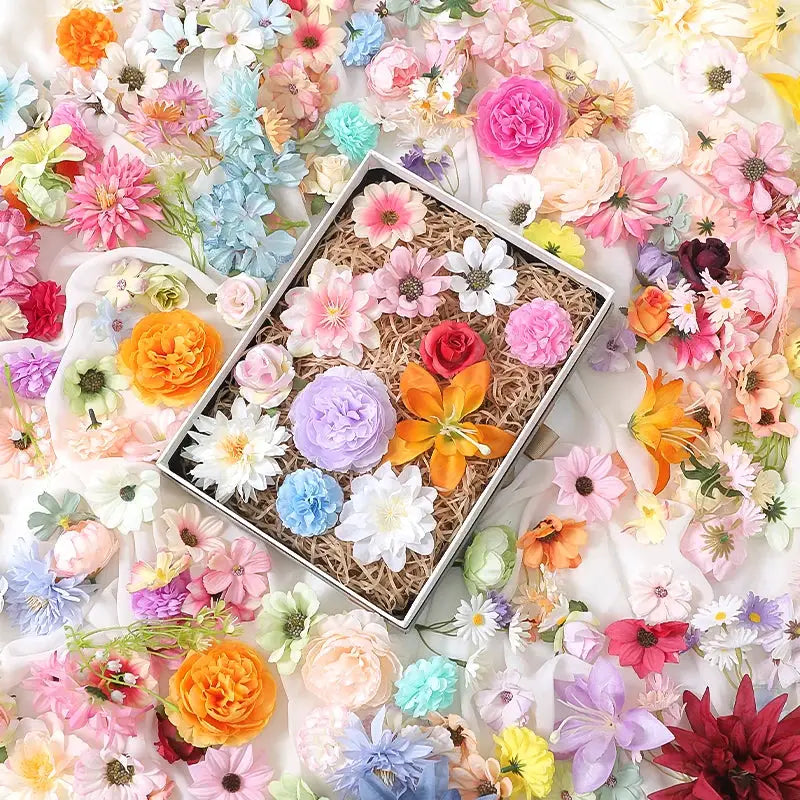 Silk artificial flower set in a decorative box with assorted blooms in pinks, yellows, and purples for home decor and DIY crafts