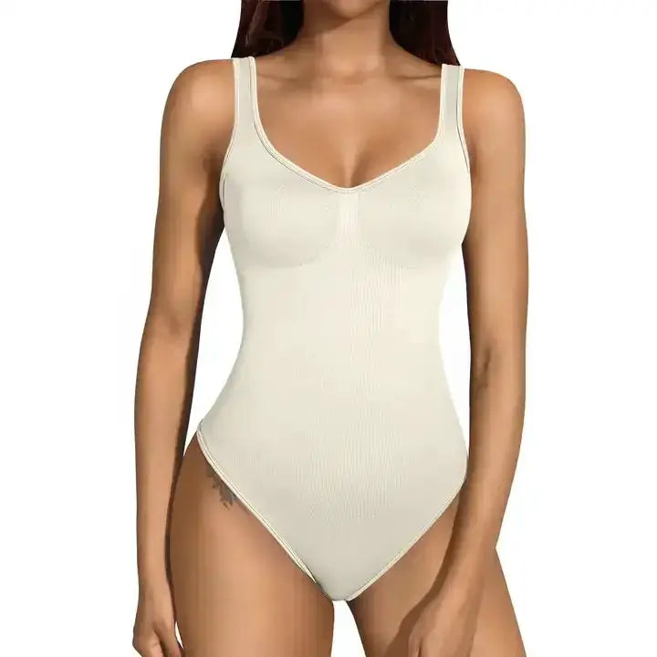 Bodysuit beige seamless ribbed knit with wide tank straps and V-neck.