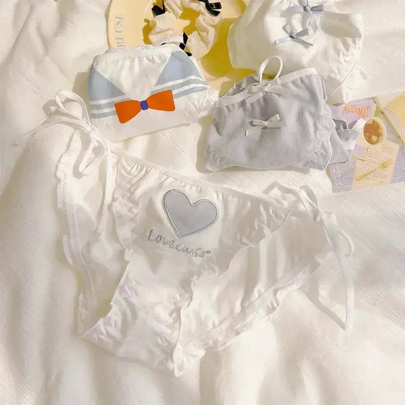Women's cotton underwear set with lace-up sides, heart embroidery and bow accents