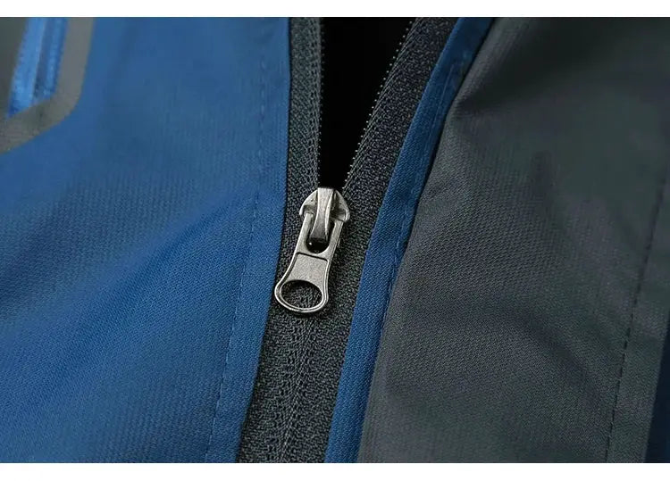 TRVLWEGO camping hiking jacket for men, blue and black waterproof windbreaker with metal zipper